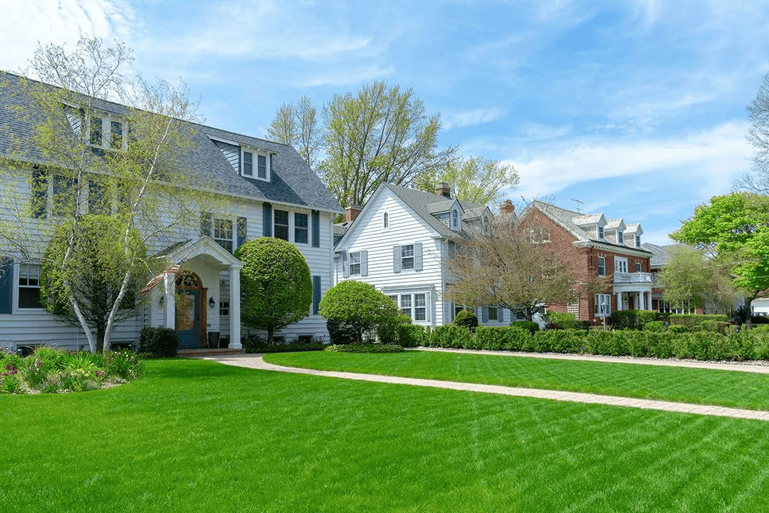 Row of homes after the best lawn care service near me in Brookhaven, Pennsylvania