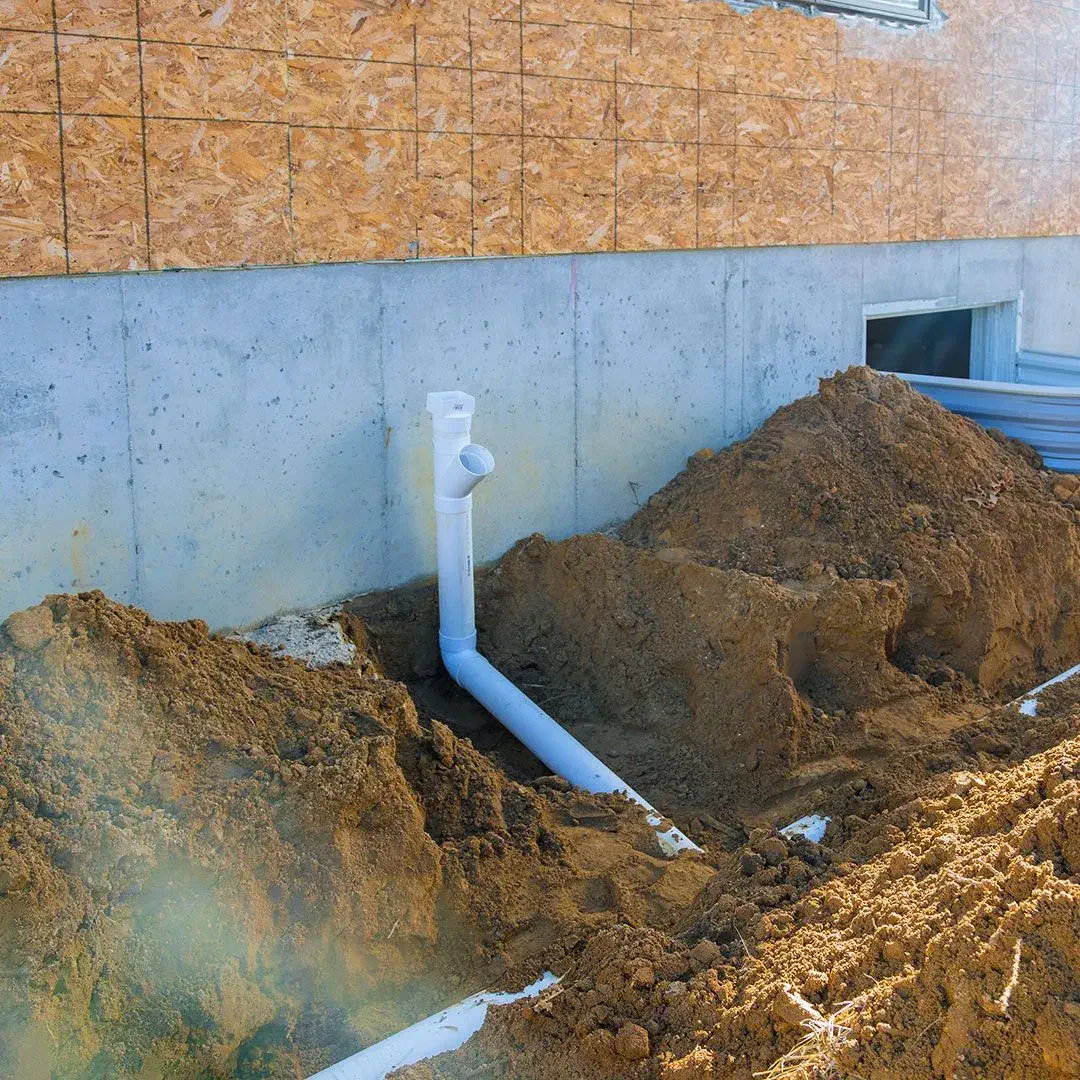 A pipe near a house for stormwater management near me