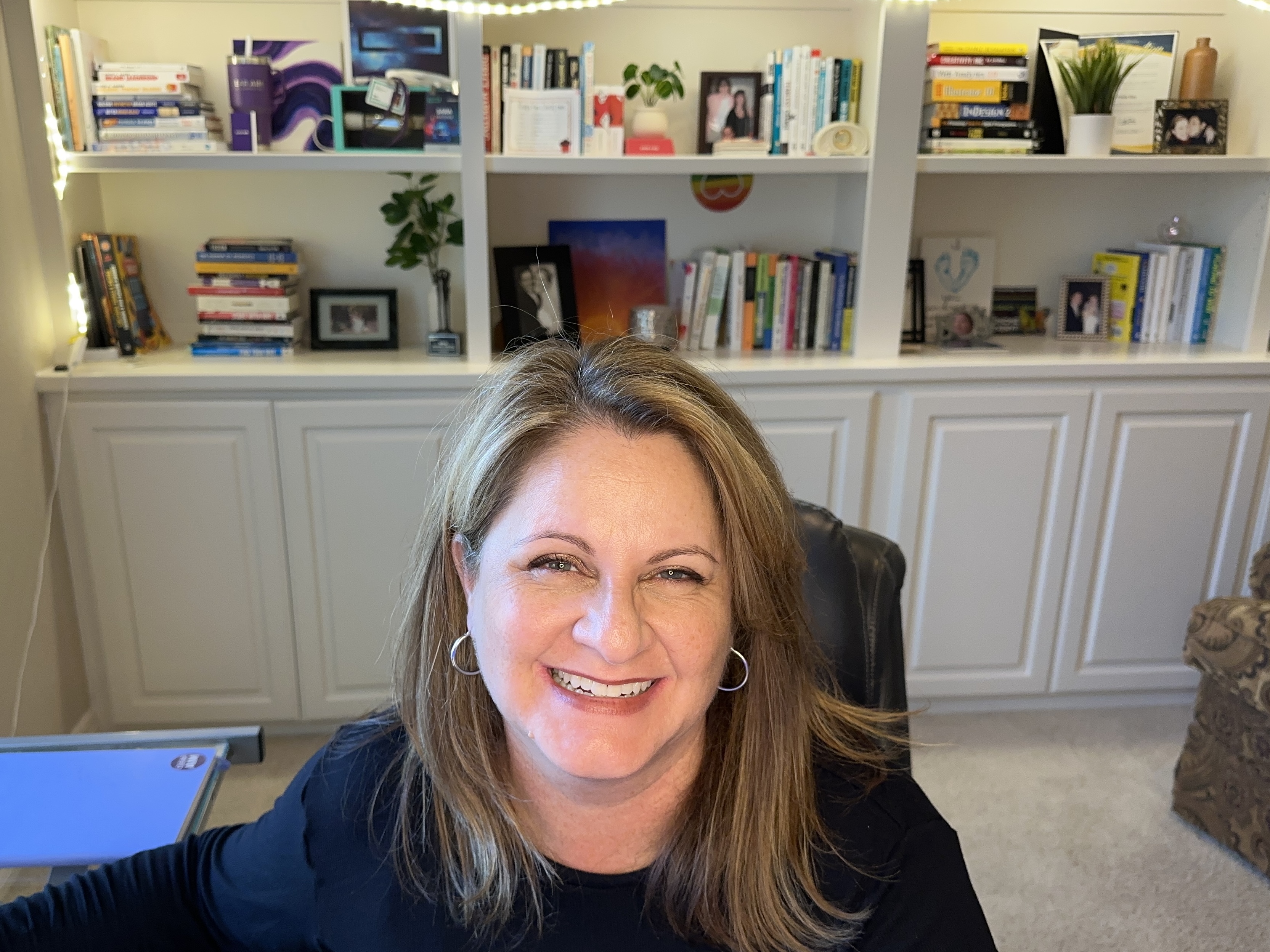 Smiling photo of Sara Mariani in her office
