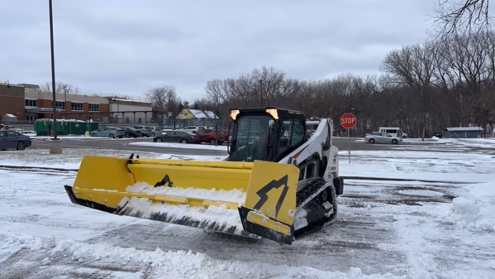 skid-steer loader with snow plow