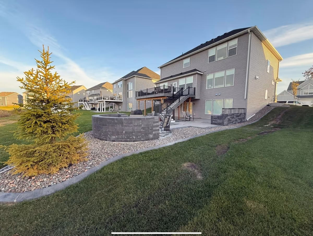 landscape and patio with firepit