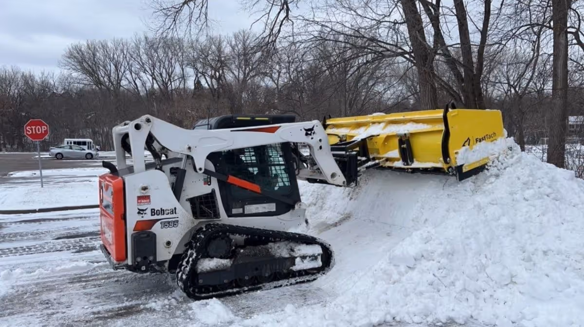 skid-steer loader and snow plow