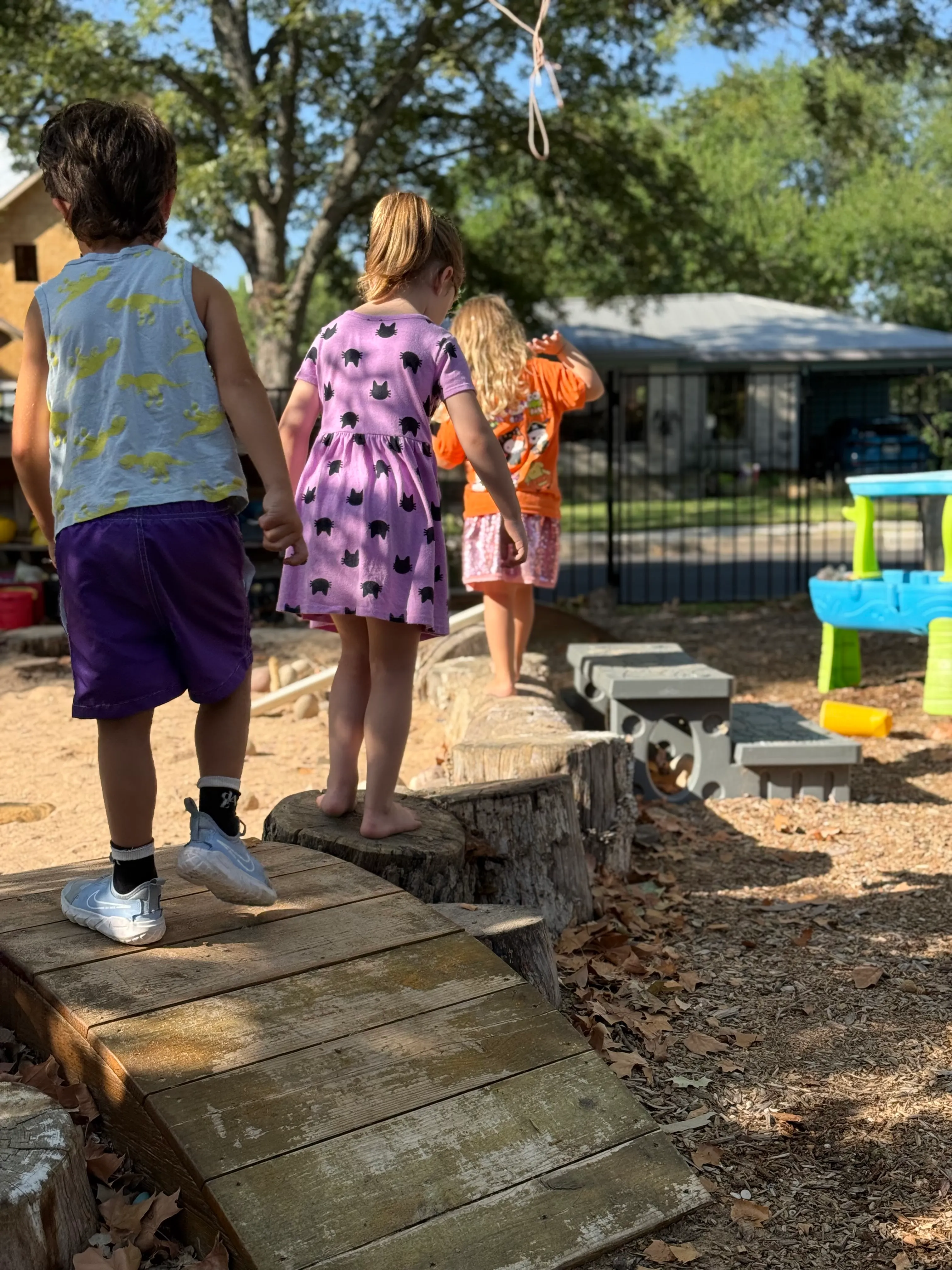 [background image] captivating photo of a serene outdoor playground (for a preschools & daycare)