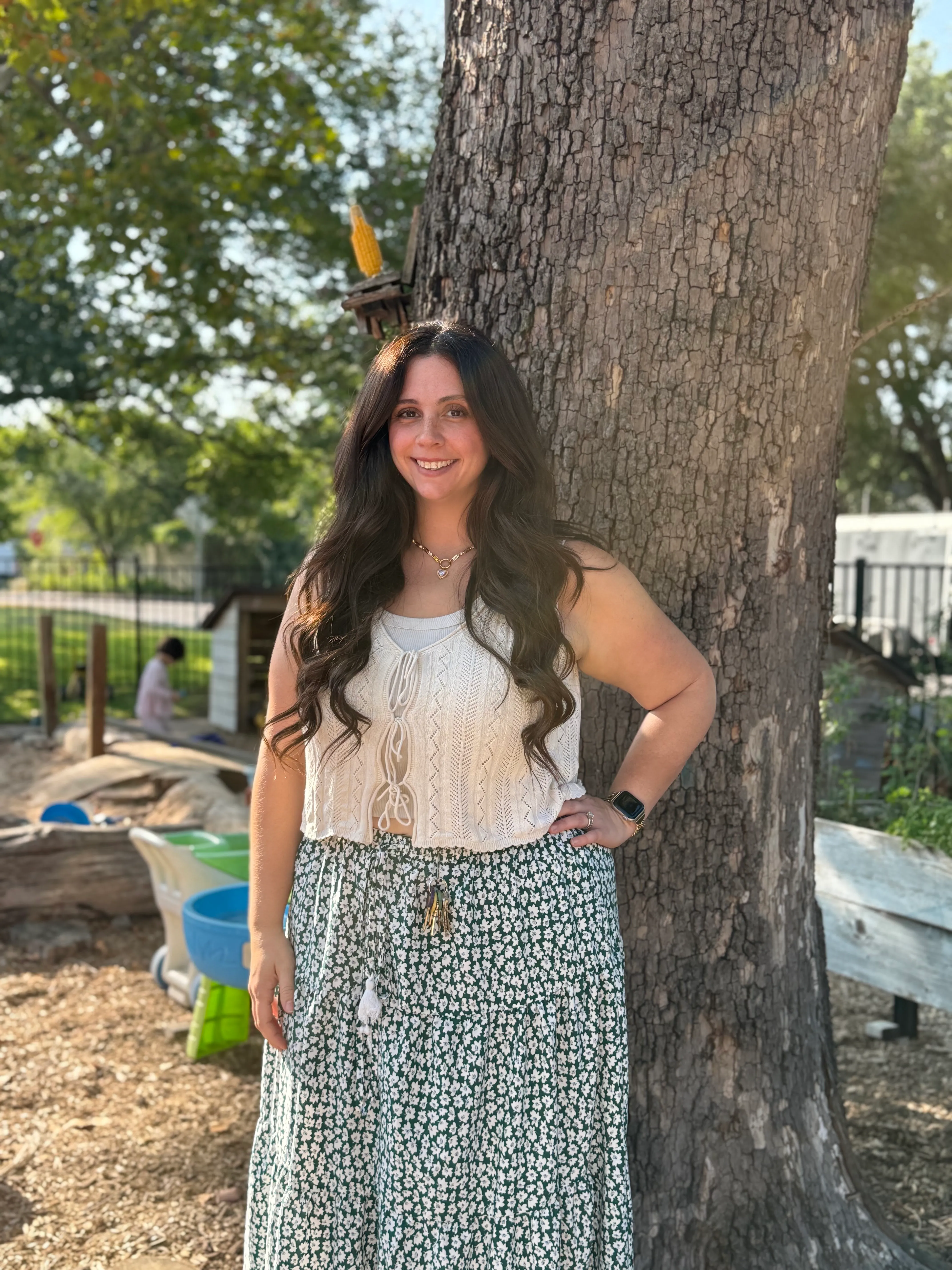 image of volunteer teaching children