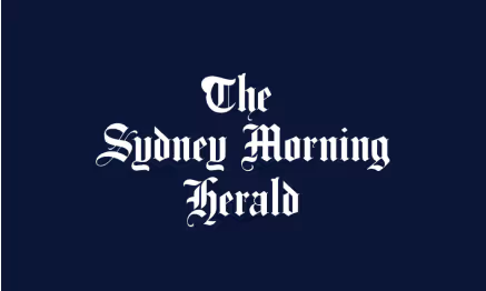 The Sydney Morning Herald newspaper logo with white gothic text on a dark blue background.