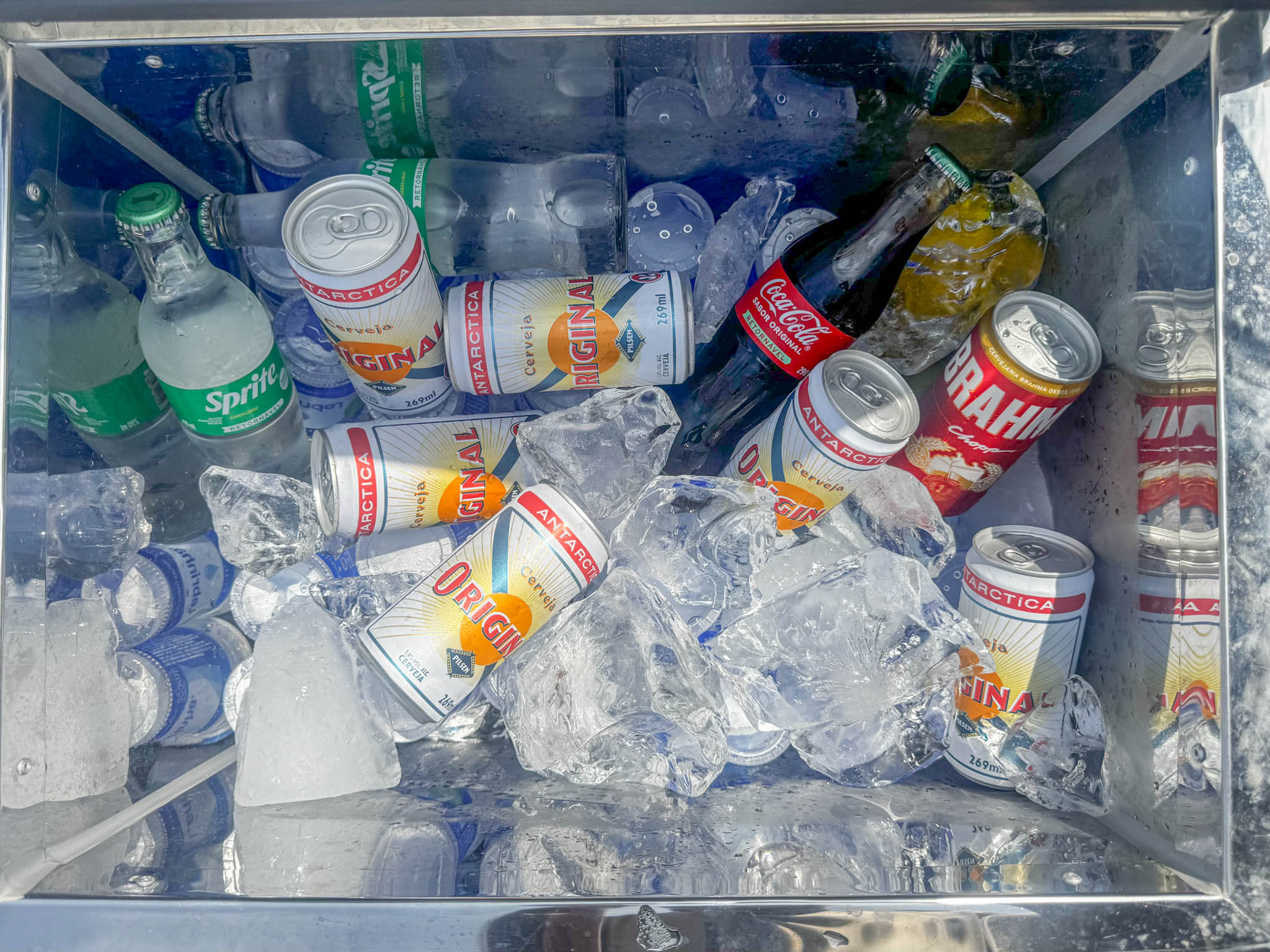 cooler with softer drink, water and beer
