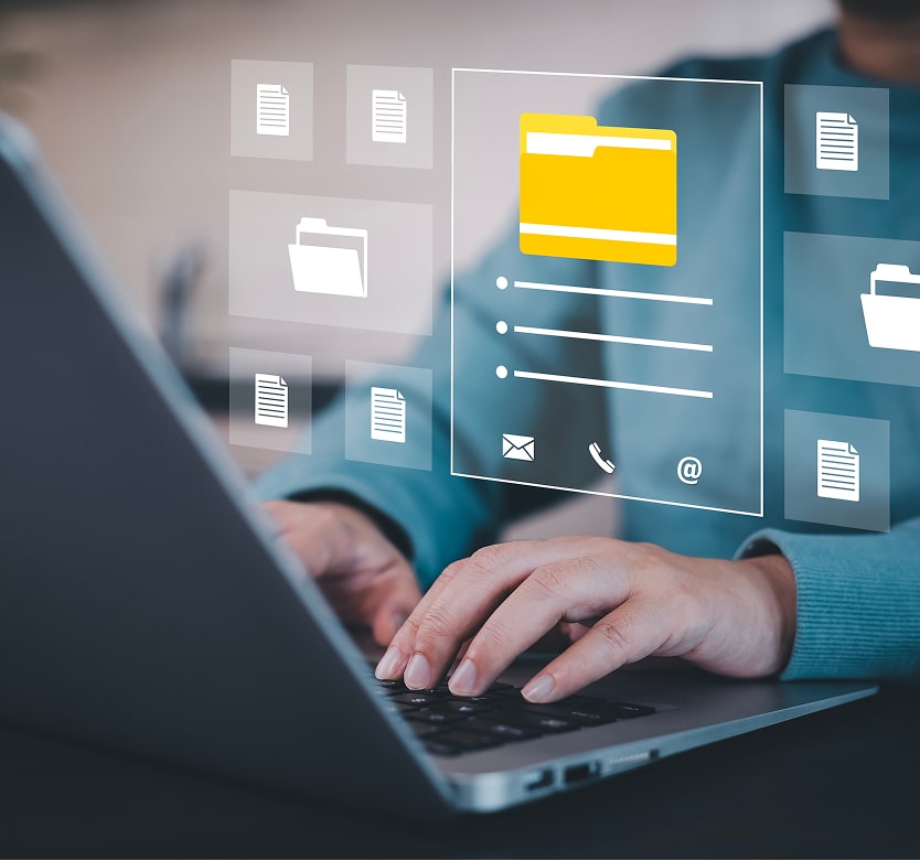 Person using laptop with secure digital document archive