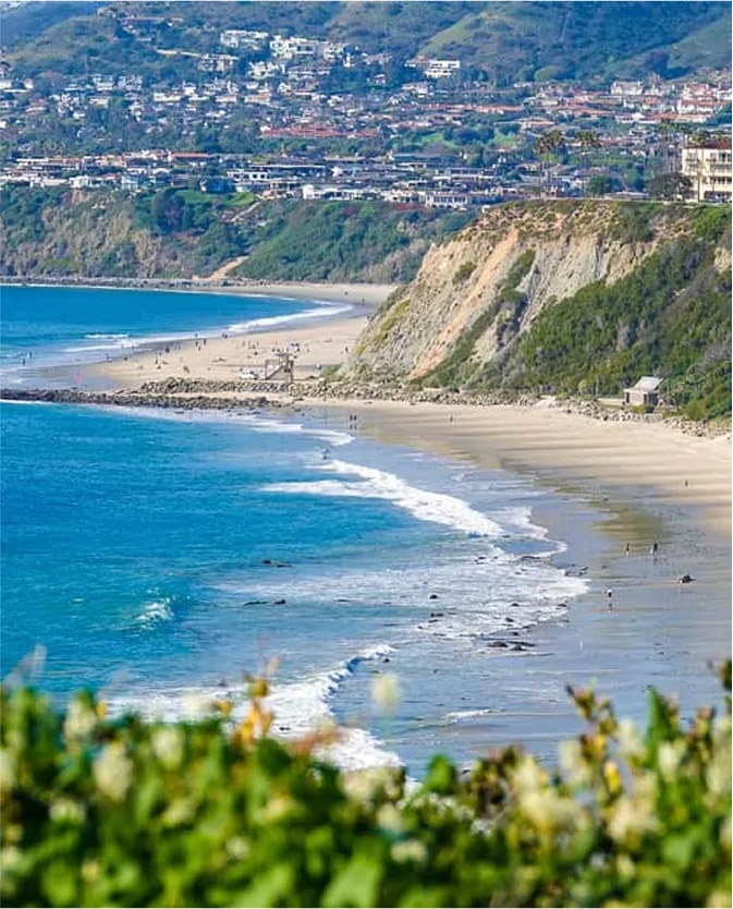 Aerial view of Orange County coastline with cliffs and ocean