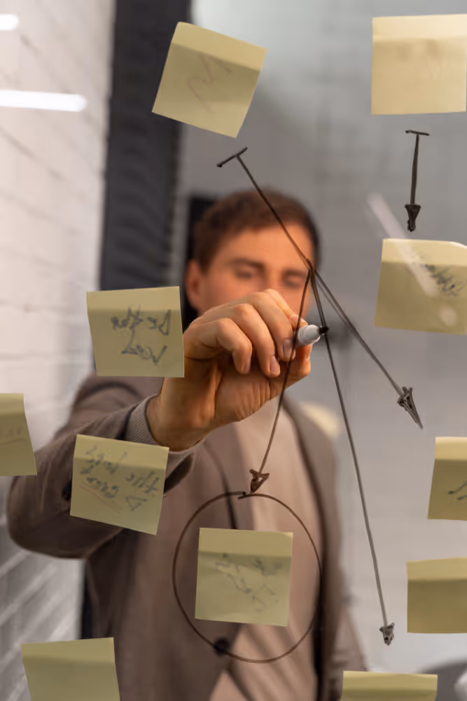 Decorative illustration with a wavy line, a meeting scene image, and a heart shape icon.