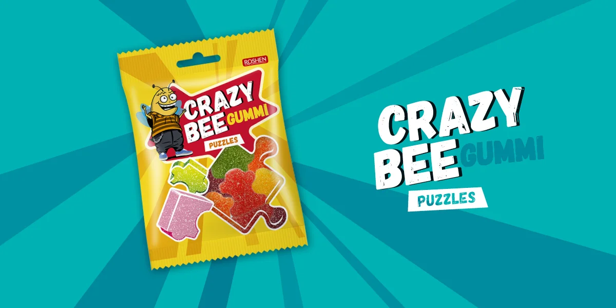 Crazy Bee Gummi Puzzles gumicukor-tasak türkiz háttéren