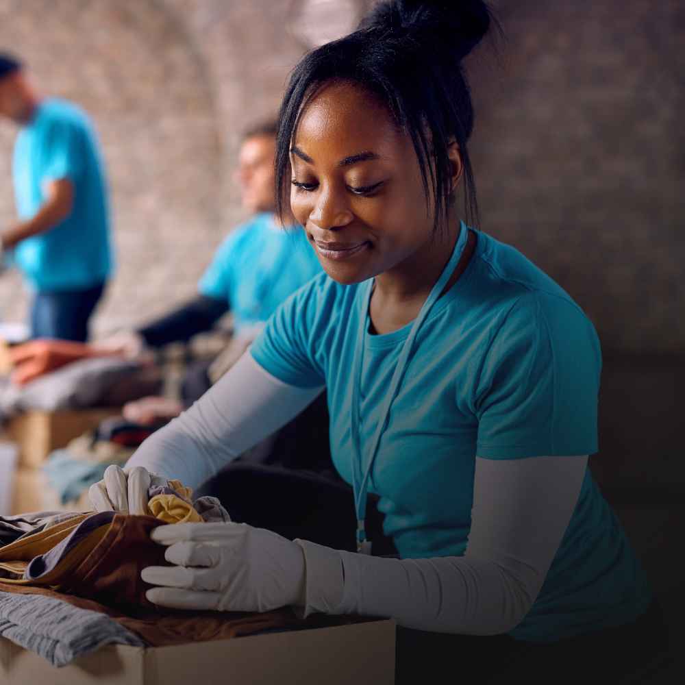 women packing meals at a food pantry