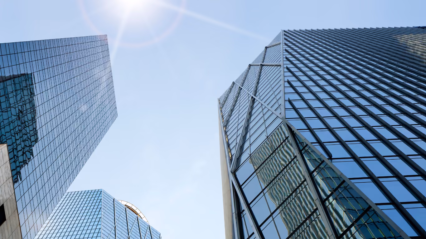 Glass office building viewed from below