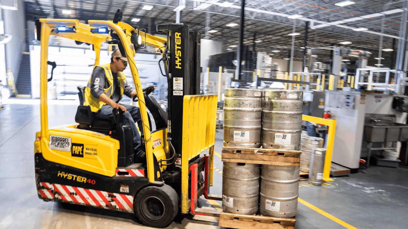 Forklift operator in a warehouse