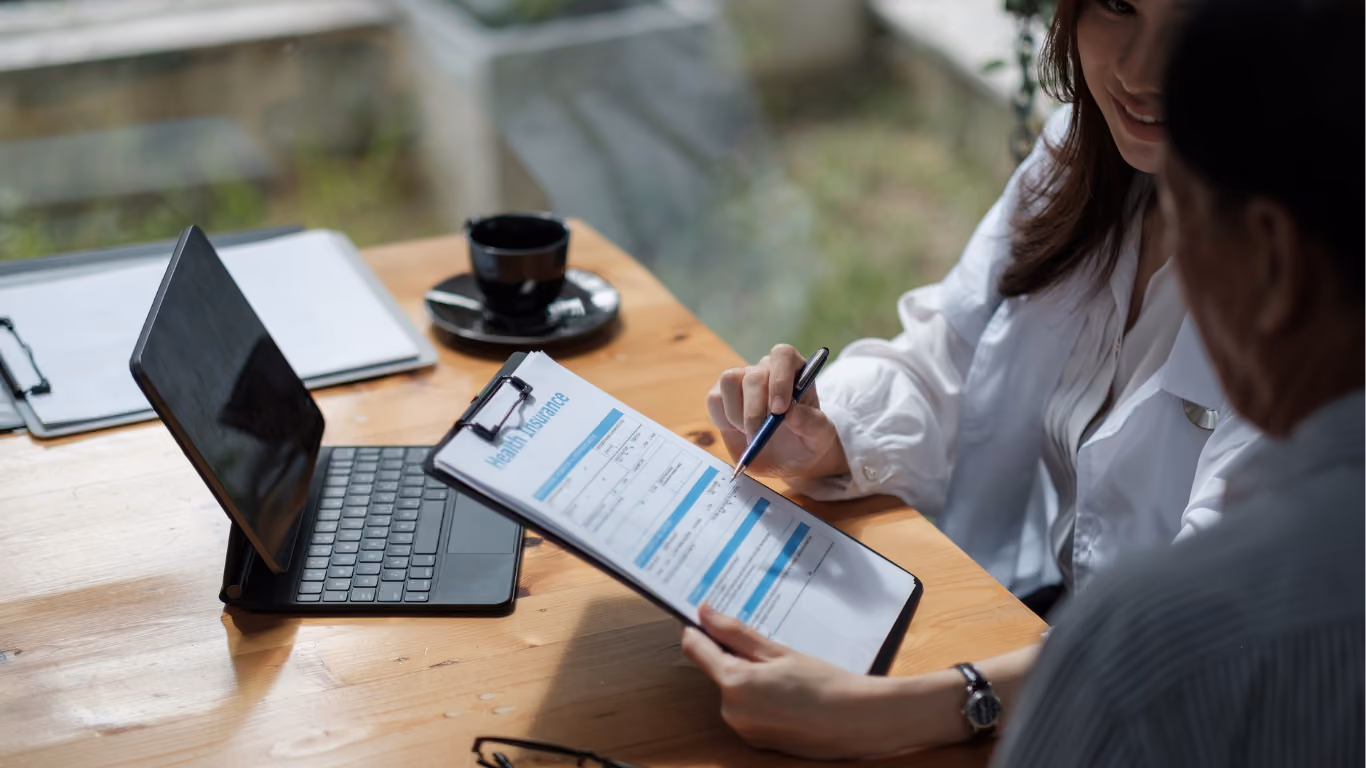 Financial professional reviewing tablet