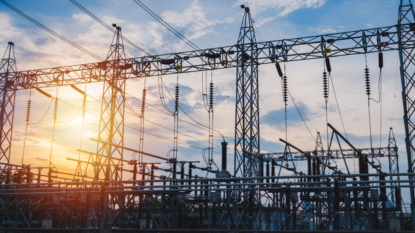 Electrical power lines at sunset