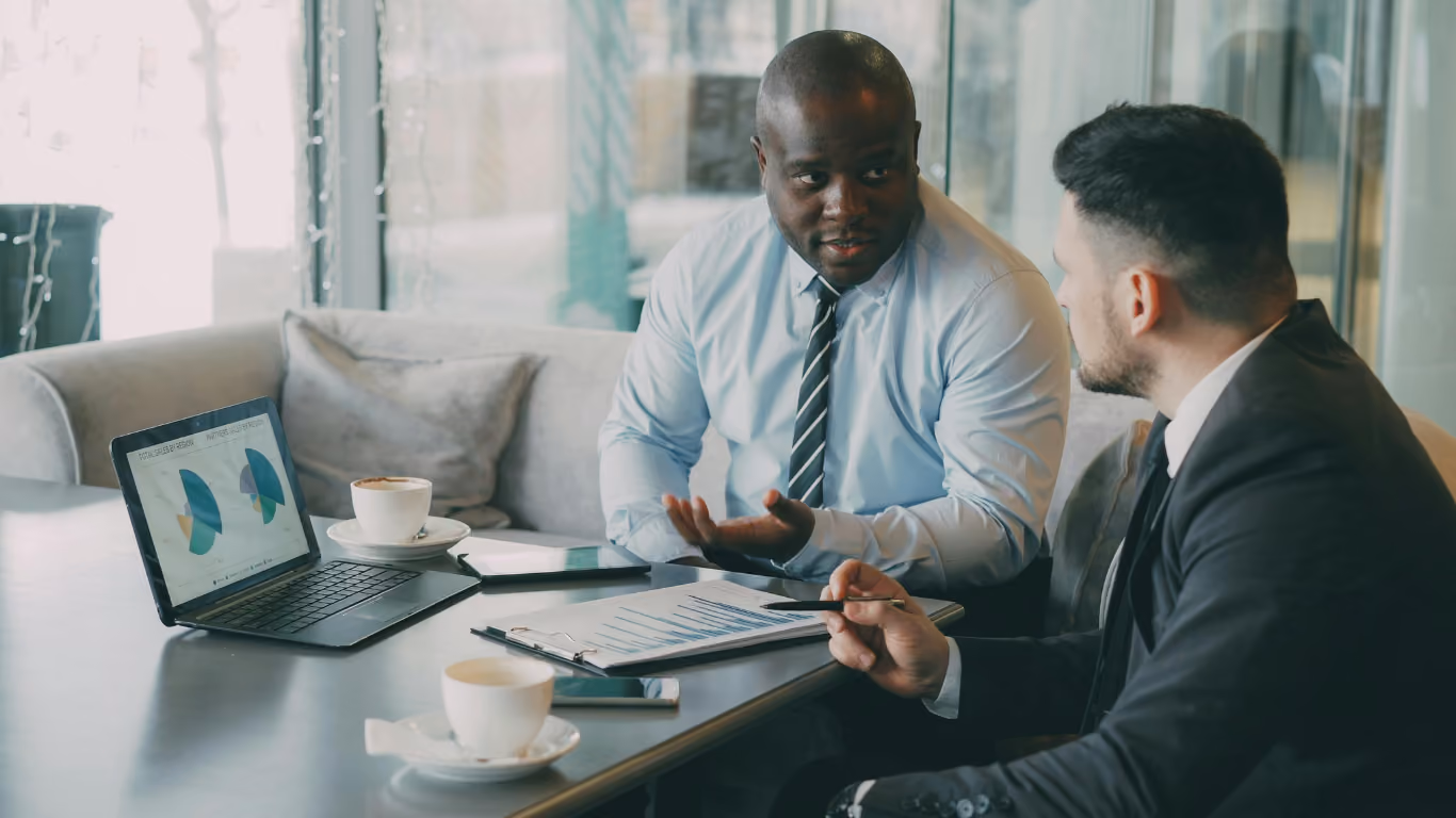 Colleagues discussing documents
