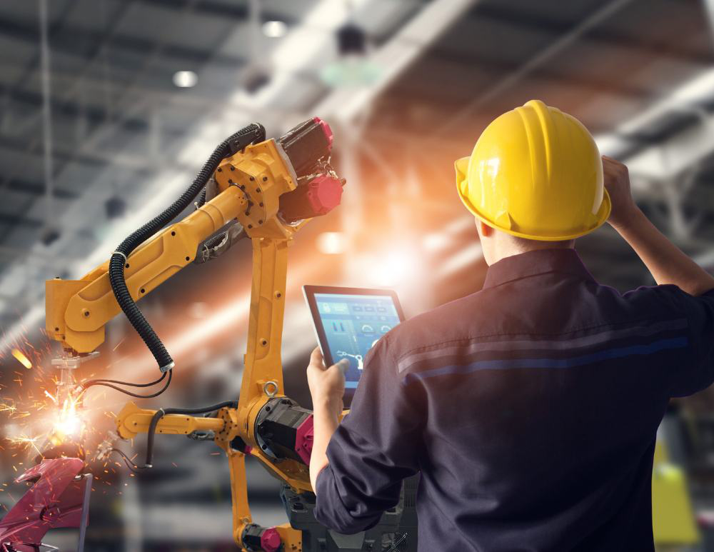 Manufacturing professionals coordinating production operations