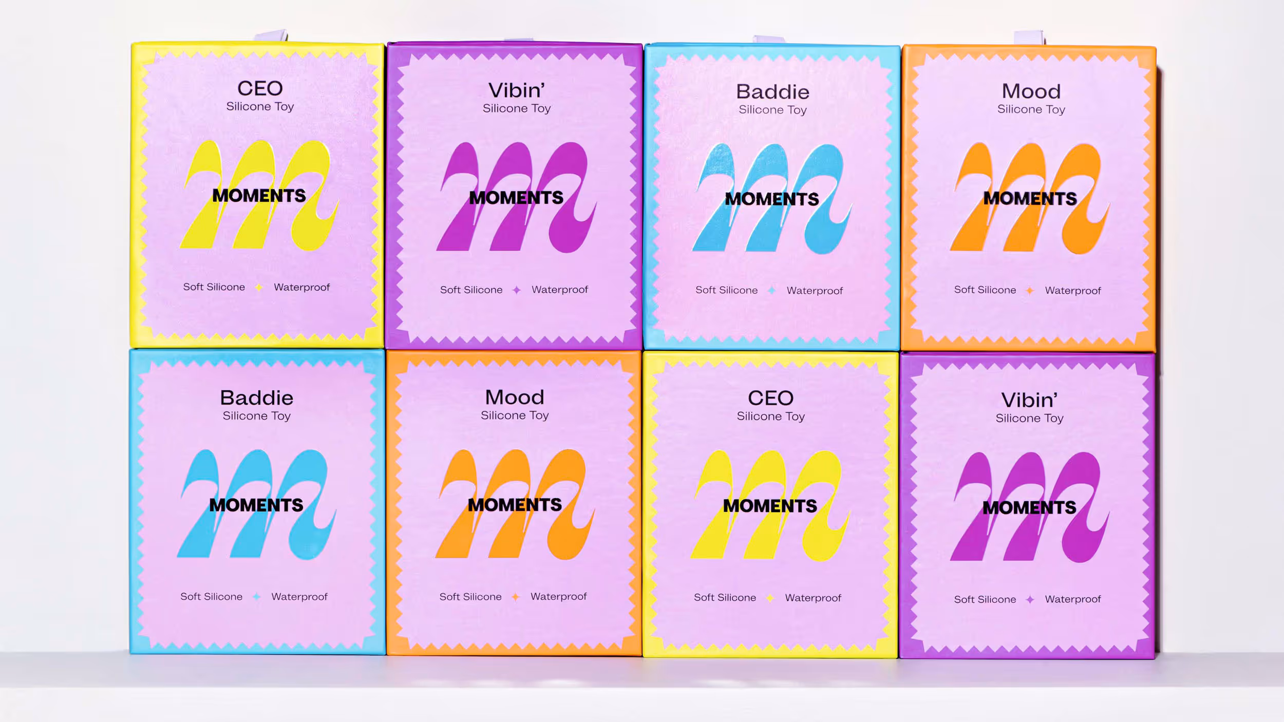 Eight colorful boxes of silicone toys labeled CEO, Vibin', Baddie, and Mood, each marked waterproof and soft silicone.