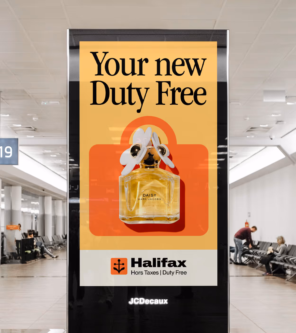 Airport digital display advertising Halifax Duty Free featuring a bottle of Daisy Marc Jacobs perfume.