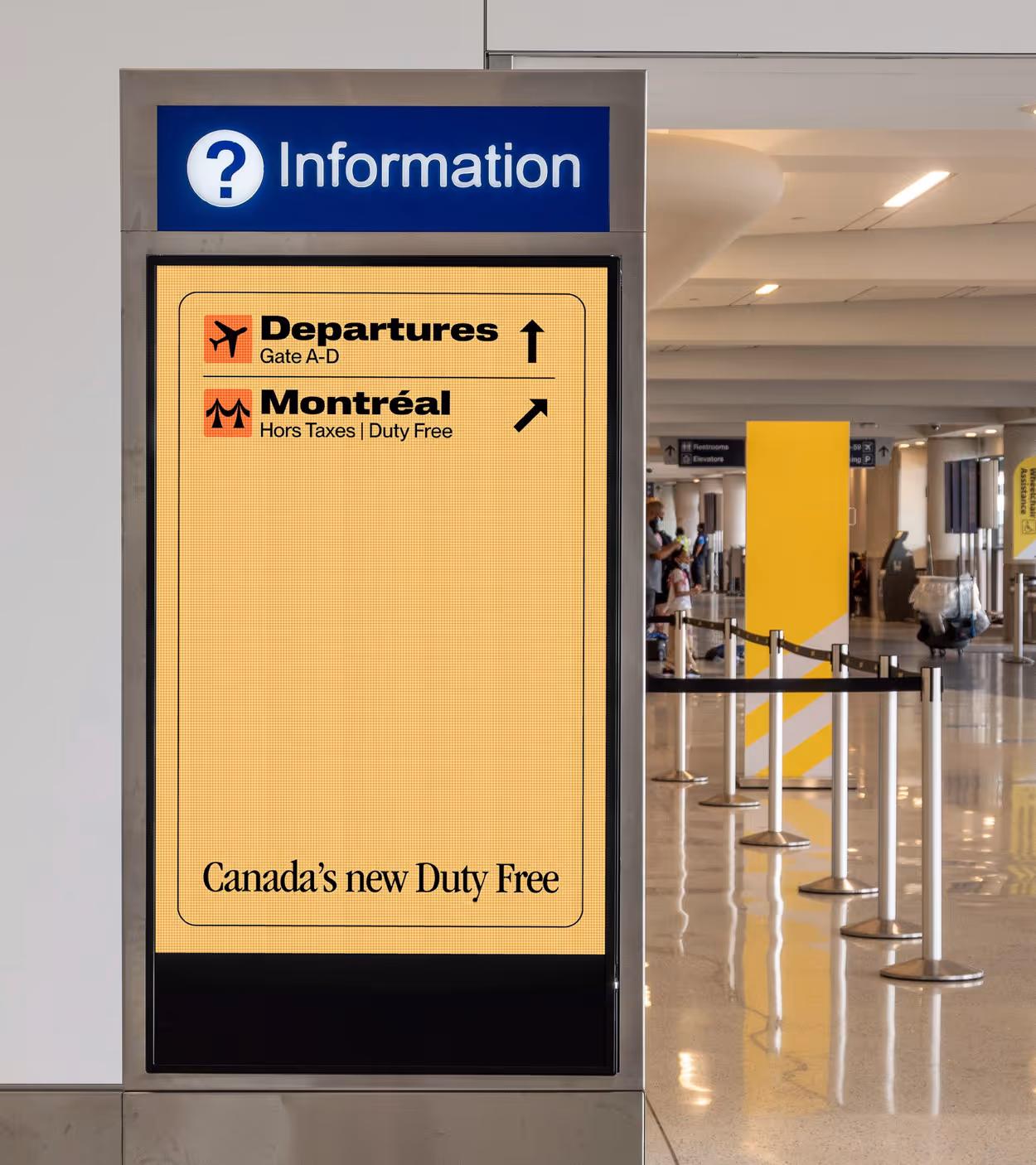 Airport information sign showing directions for Departures at Gate A-D and Montreal Duty Free shopping.