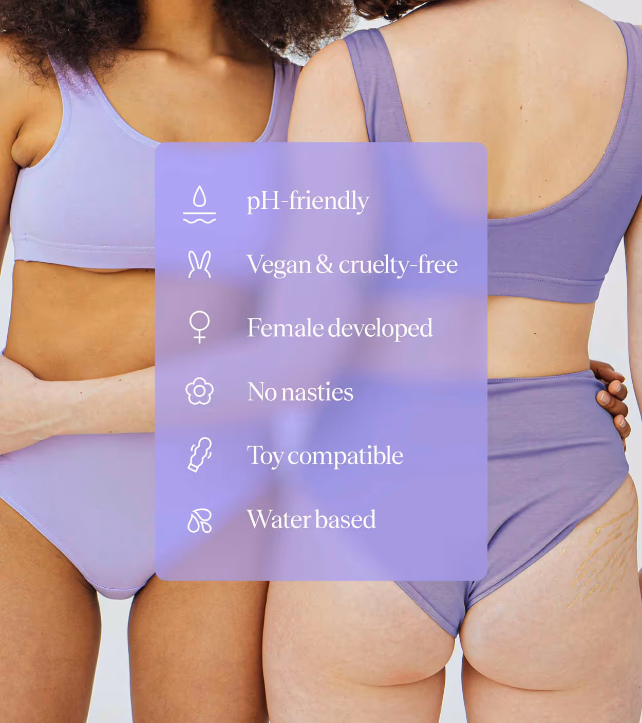 Two women wearing matching lavender underwear with a lavender text box listing product features: pH-friendly, vegan & cruelty-free, female developed, no nasties, toy compatible, and water based.