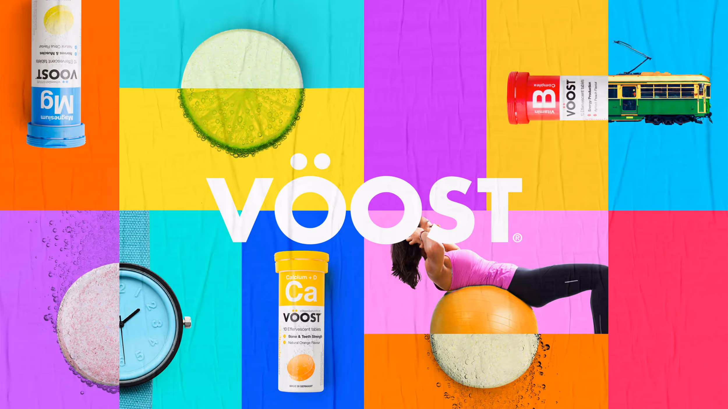Colorful collage with VOOST supplement bottles, effervescent tablets, a woman exercising on an orange stability ball, a lime slice, a clock, and a tram.