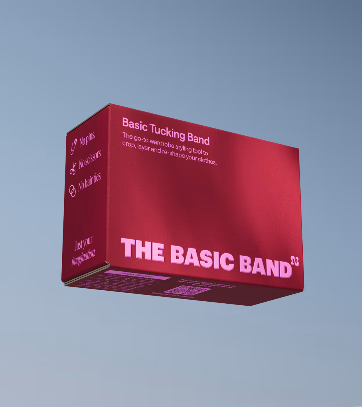 Magenta packaging box for The Basic Band, a wardrobe styling tool for cropping, layering, and reshaping clothes, with icons indicating no pins, scissors, or hair ties needed.