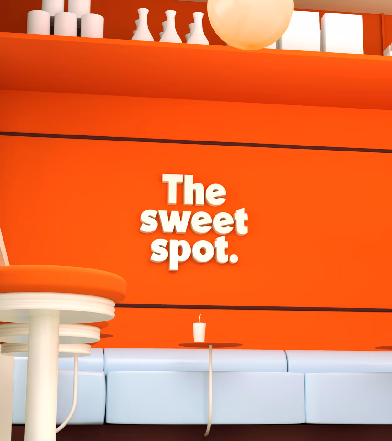 Modern interior with orange wall featuring white text 'The sweet spot.', white tables, orange cushioned seats, and a white cup with a straw.