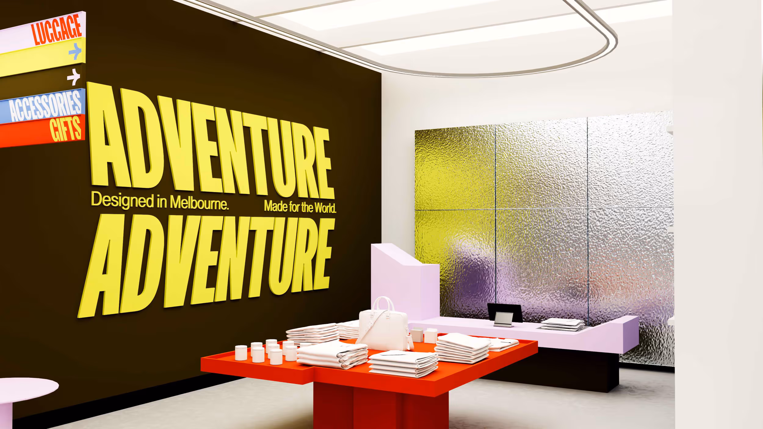 Modern retail store interior with a red display table holding folded white clothing and accessories, and a wall featuring large yellow text reading 'ADVENTURE Designed in Melbourne. Made for the World.'