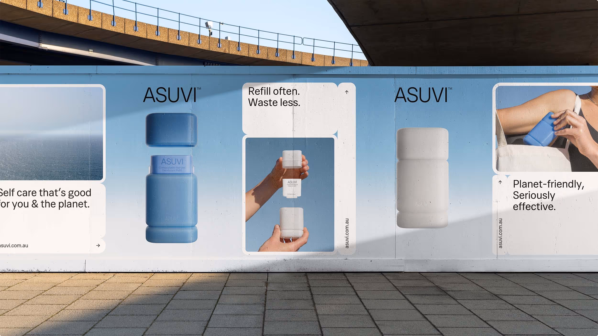 Outdoor billboard advertisement featuring ASUVI refillable deodorant with text messages about self-care, refilling, and planet-friendly efficacy.