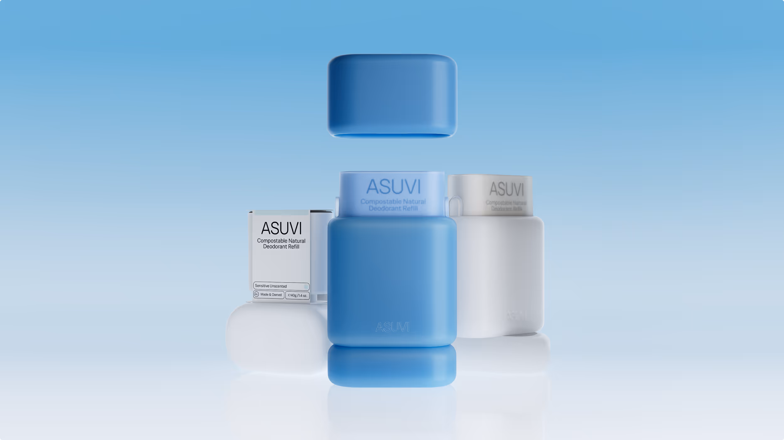 Two ASUVI compostable natural deodorant refill containers, one blue and one white, with the blue cap floating above the blue container, against a blue gradient background.