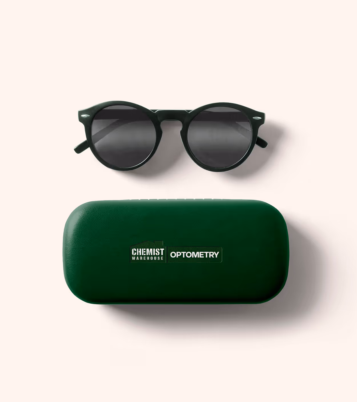 Dark green round sunglasses above a matching dark green glasses case with Chemist Warehouse Optometry logo.