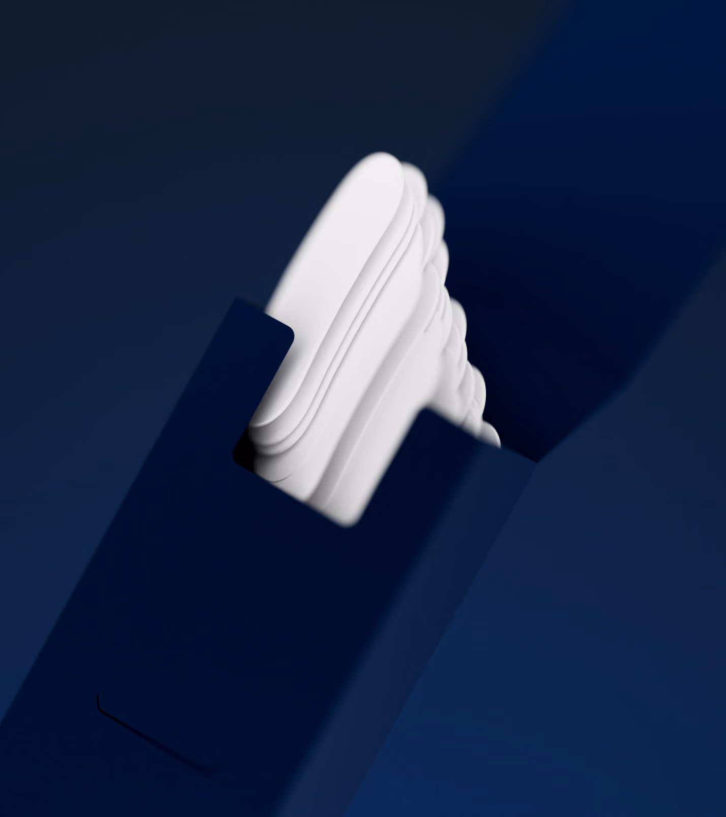 Stack of white, rounded rectangular sheets inside a dark blue container.