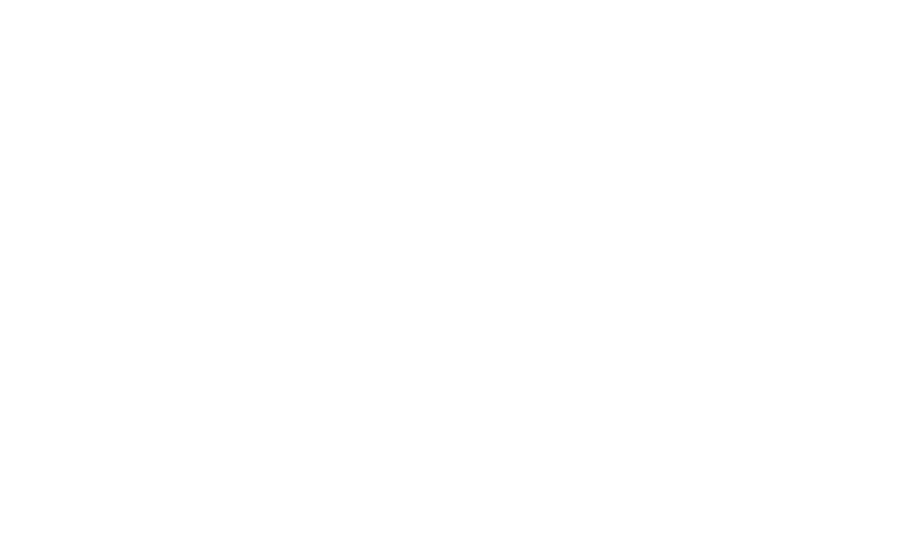 White silhouette of a castle with three towers, two stars above side towers, and a cross on the middle tower, above a wavy line.
