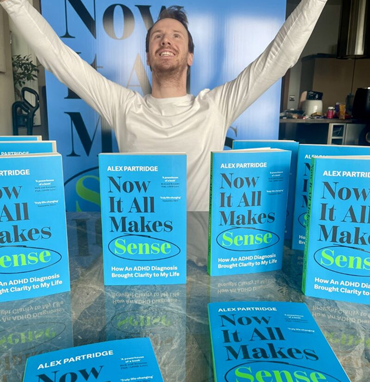 Alex Partridge with his book, 'Now it All Makes Sense'