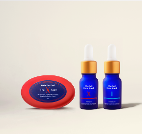 Two blue dropper bottles with gold caps and a red oval container, all labeled 'Herbal Face Food' and 'The X Care,' on a light background.