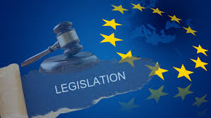Gavel and torn paper with the word 'LEGISLATION' overlaid on a European Union flag background.