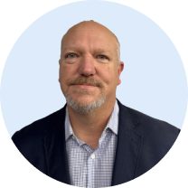 Portrait of a professional wearing a blazer and collared shirt