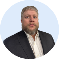 Portrait of a professional wearing a blazer and collared shirt