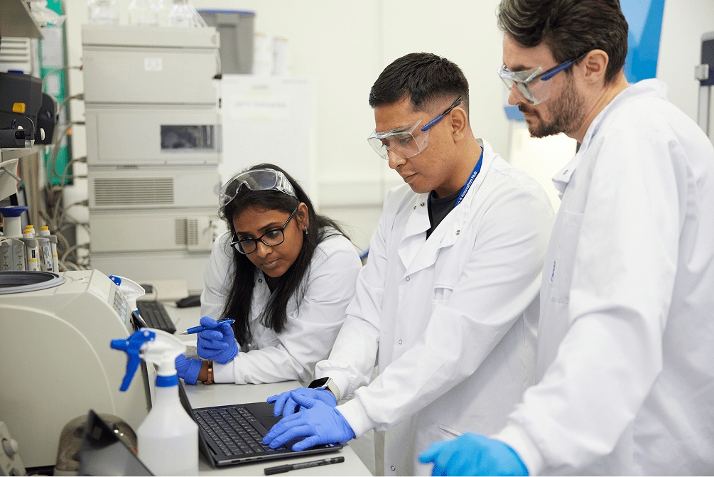 Three members of our team working hard in the lab