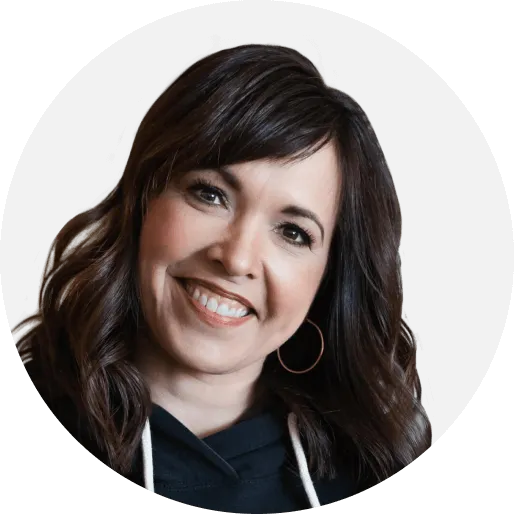 A woman with a smile on her face.