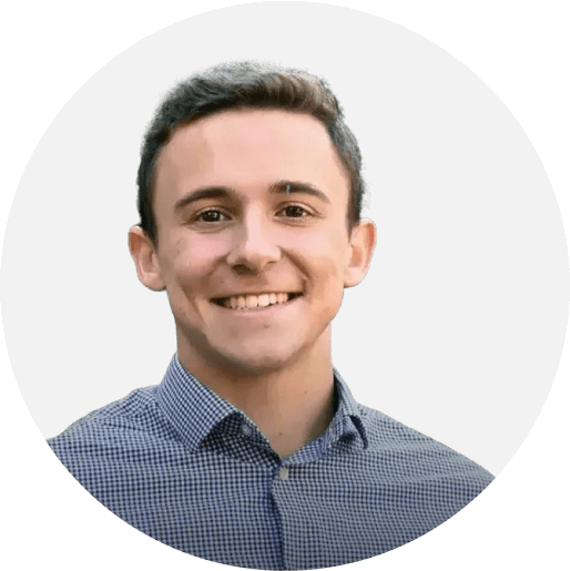 A man with a blue shirt and a checkered pattern.