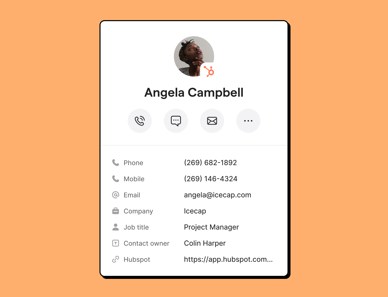 A cell phone with a contact number on the screen.