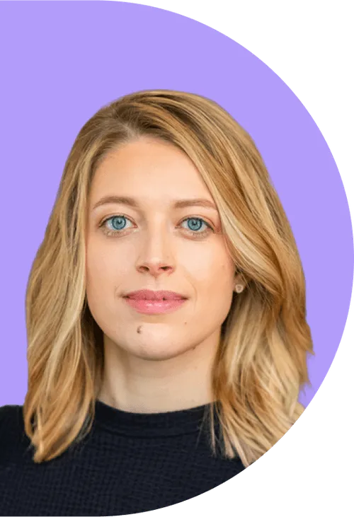 A woman with blonde hair and blue eyes.
