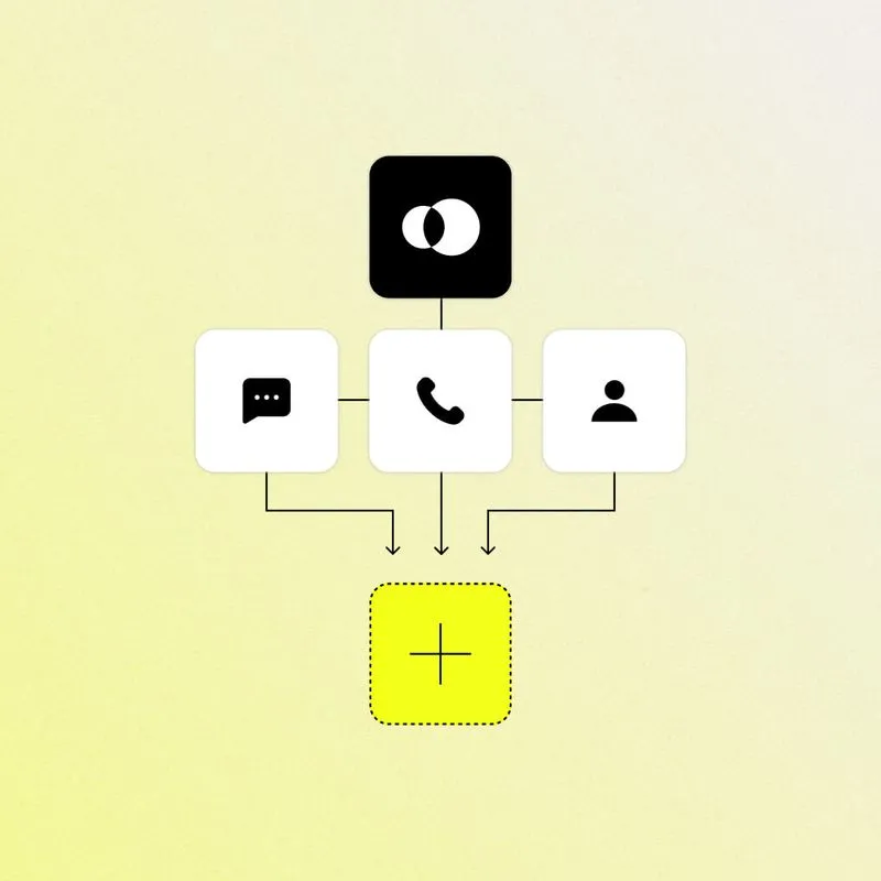A yellow button with a black circle on it.
