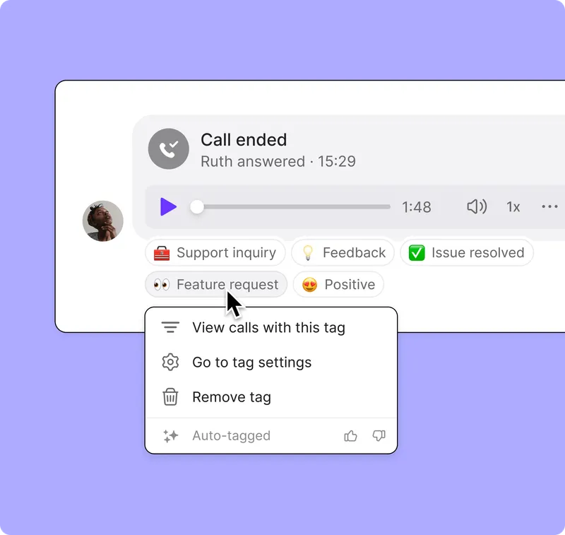 A purple background with a phone call button.