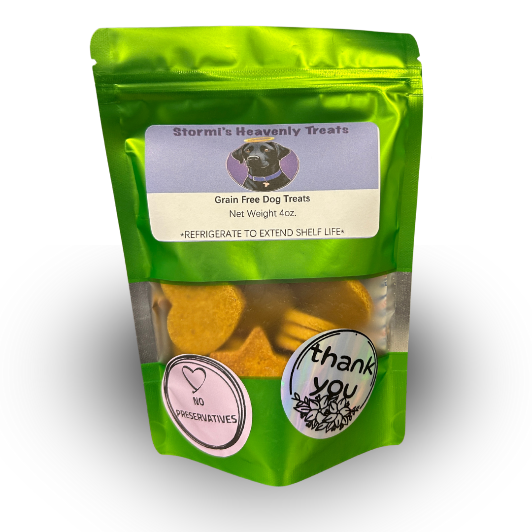 Green resealable bag of grain-free dog treats with a label featuring a black dog and text indicating 4 oz net weight and refrigeration instructions.