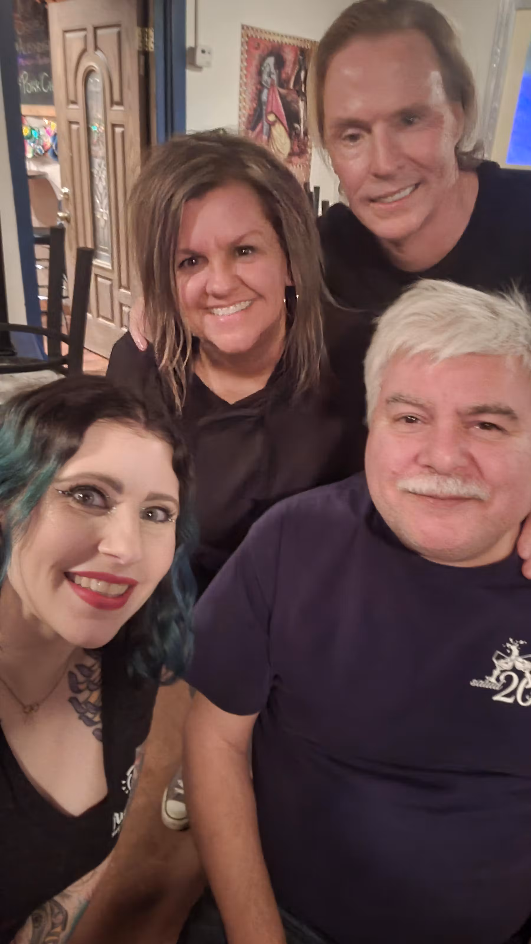 Owner Alfredo alongside two women and a man.