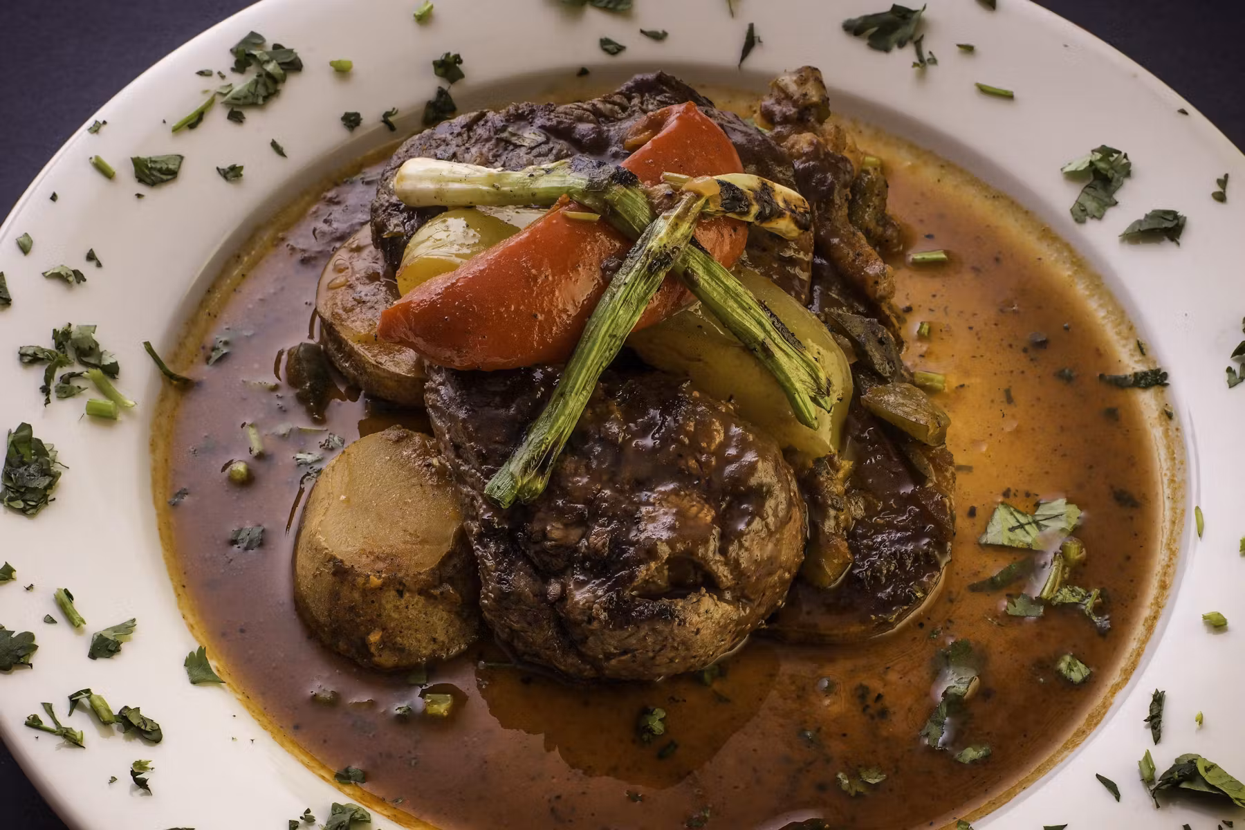 Meat served with vegetables in its juices.