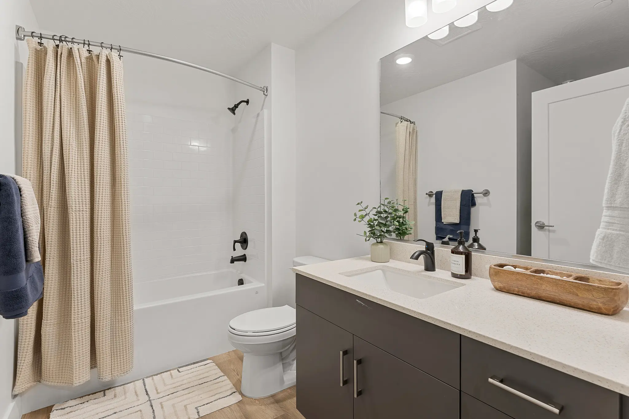 Spacious and modern apartment bathroom at Ascesa Court in St. George, UT.